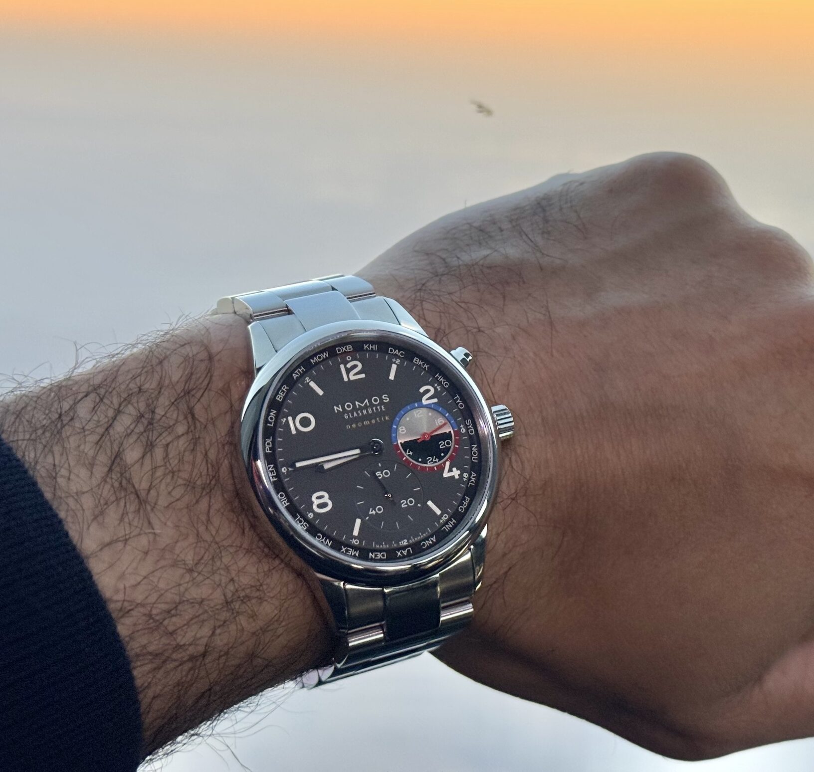 Owner review: Nomos Club Sport Neomatik WorldTimer Volcano by @meshari_alhaj